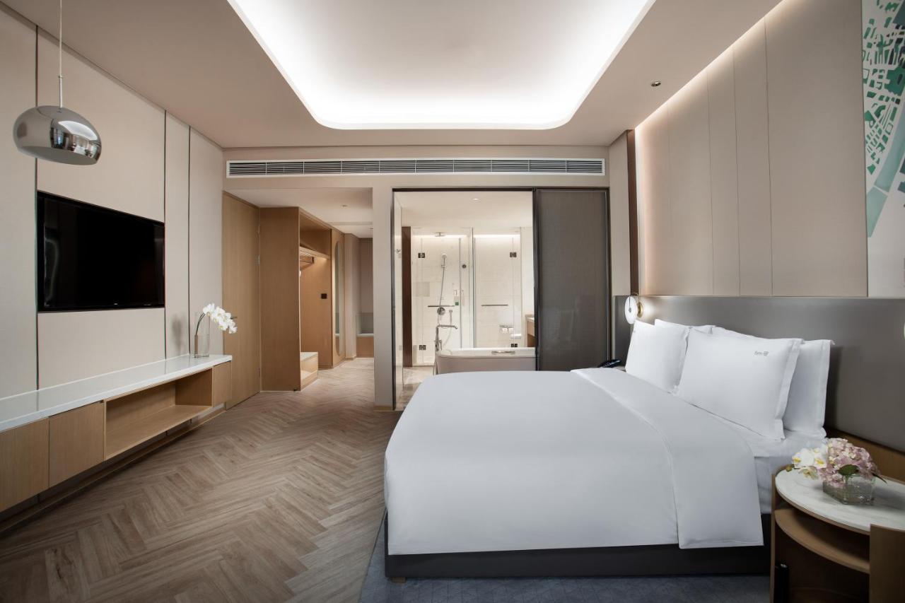 Holiday Inn Wuxi Central Station By Ihg Экстерьер фото